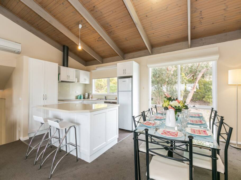 Well appointed kitchen with Miele appliances and dining area (seats 8)