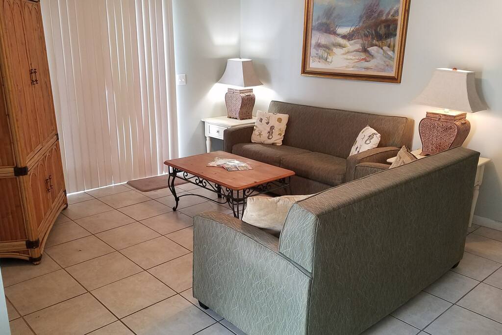 Living Room has Cable TV, DVD player and a small library of movies.