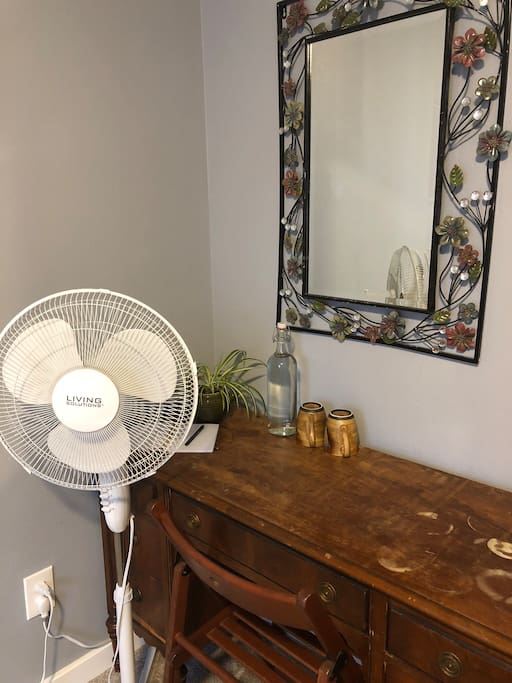 We also provide a desk, mirror, fan, and water glasses for your convenience.