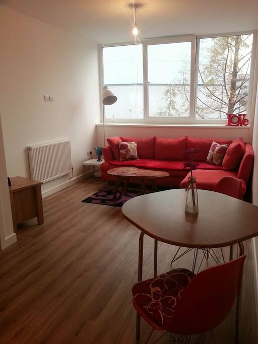 lounge, dining table and kitchen