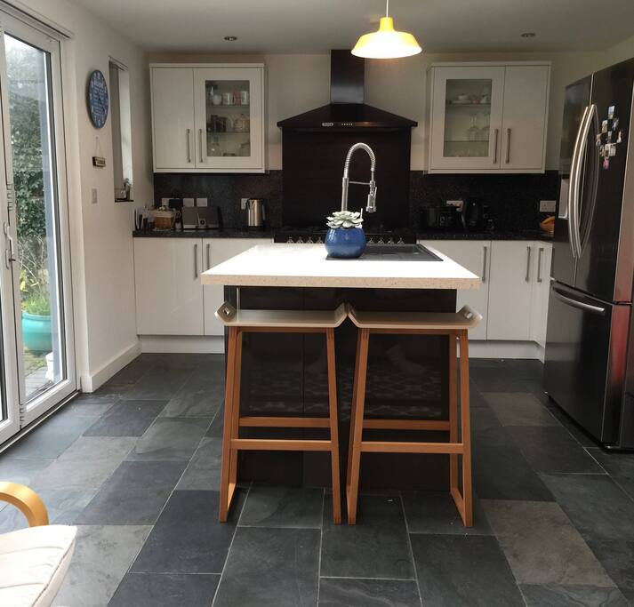 Spacious kitcken with breakfast bar and everything you'll need to whip up a meal.