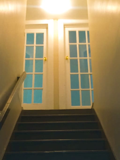The front door opens up to a bright and airy second floor home.
