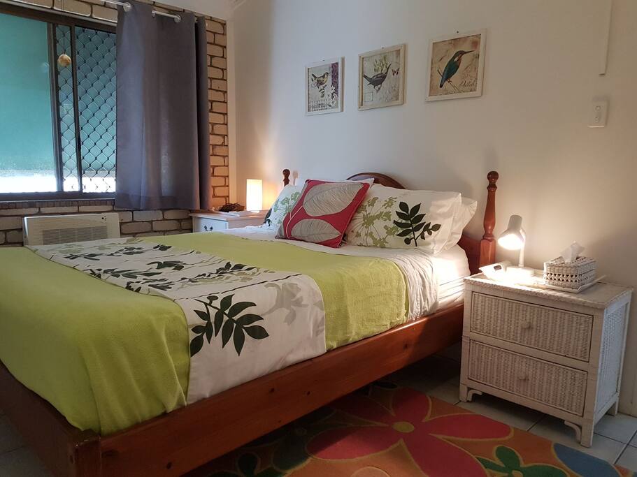 Main bedroom with comfy queen bed. Air-conditioned plus ceiling fan.