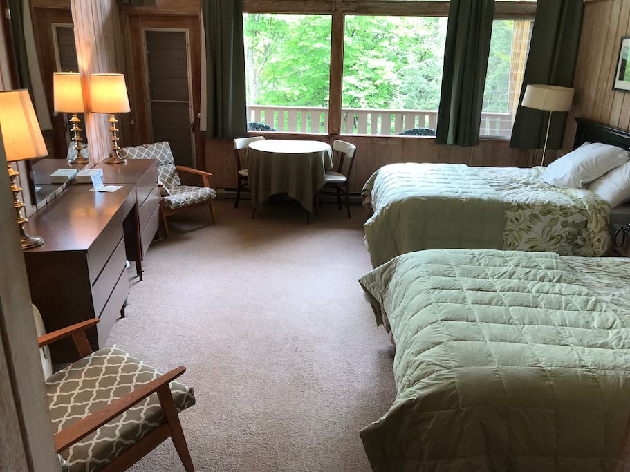 Our lodge rooms have a retro decor, 2 queen beds and a private bath.
