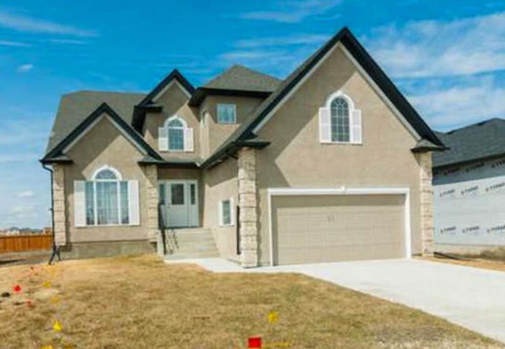 2,500 SQ FT House on 10,000 SQ FT Lot, plenty of parking on the driveway.
