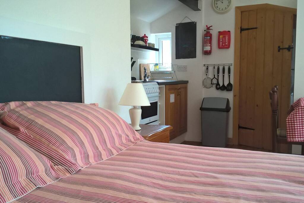 Bed and kitchen