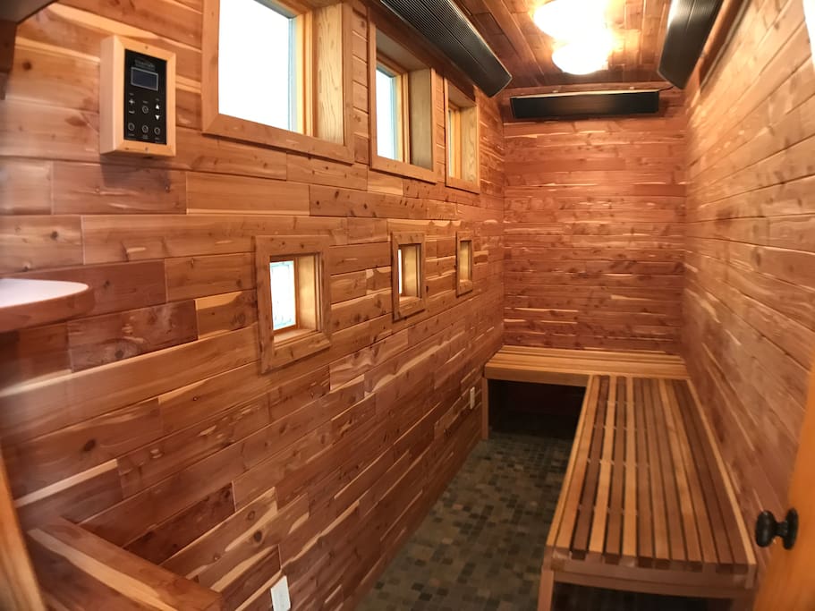The ensuite cedar sauna and spacious two-person jacuzzi tub promise rejuvenating relaxation with your special someone.