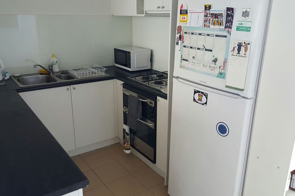 ample size kitchen with all the utensils required