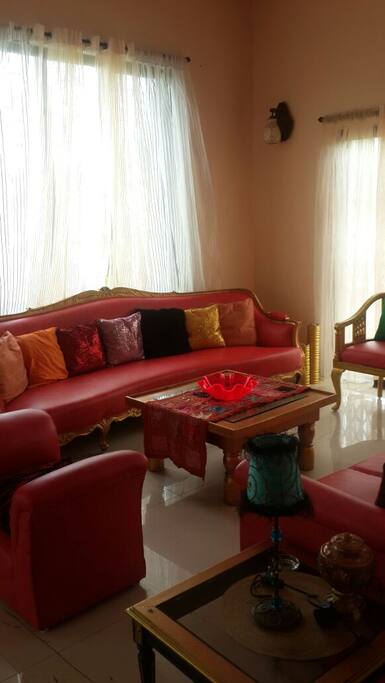 Totally refurbished Living room, with lots of natural filtered light thru the sheers.