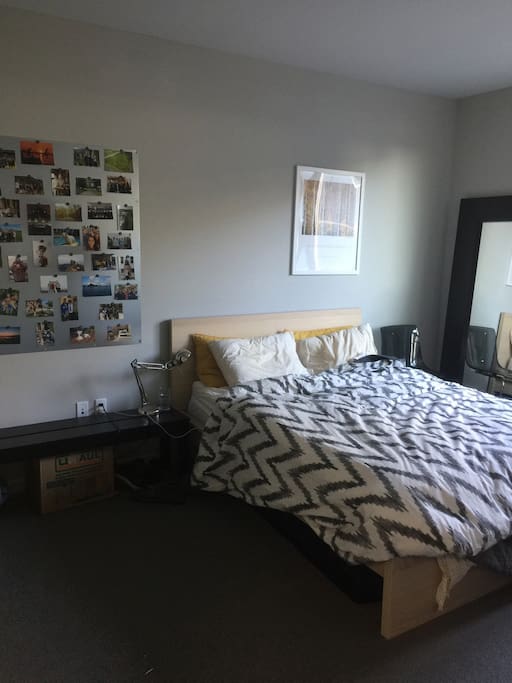 My bedroom, with a Casper mattress and an in-unit washer/dryer.