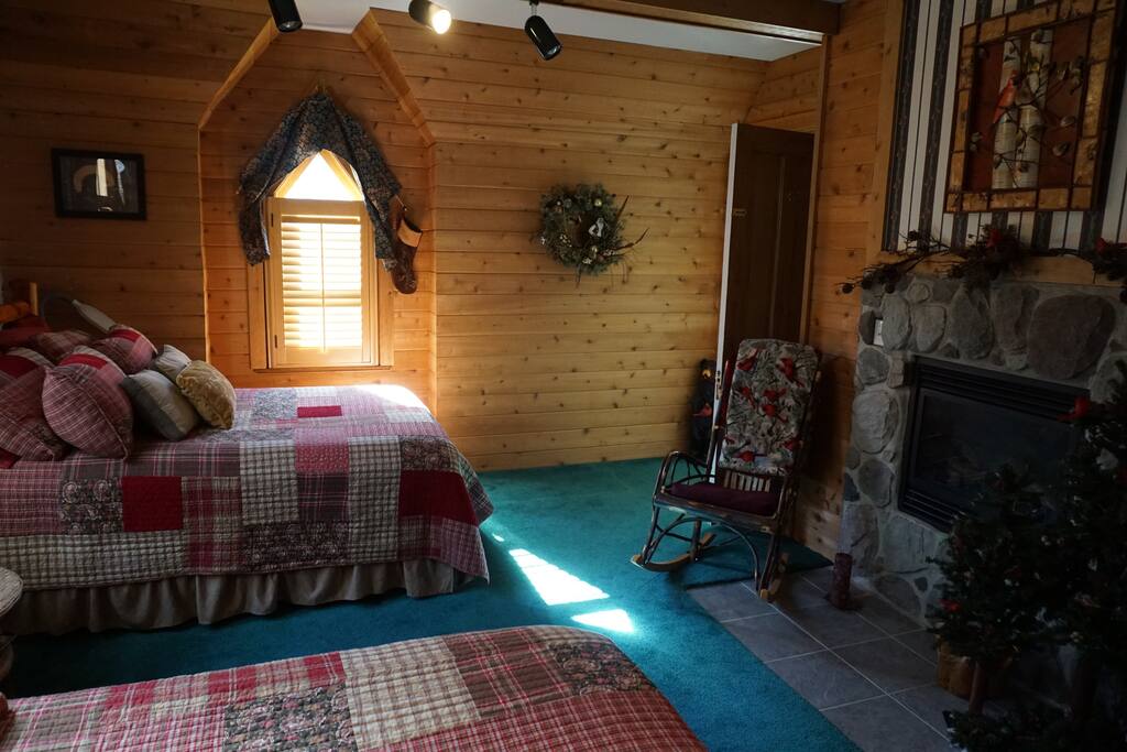 Come stay warm by the fireplace in the Northern Woods Room at the Allegan Country Inn.