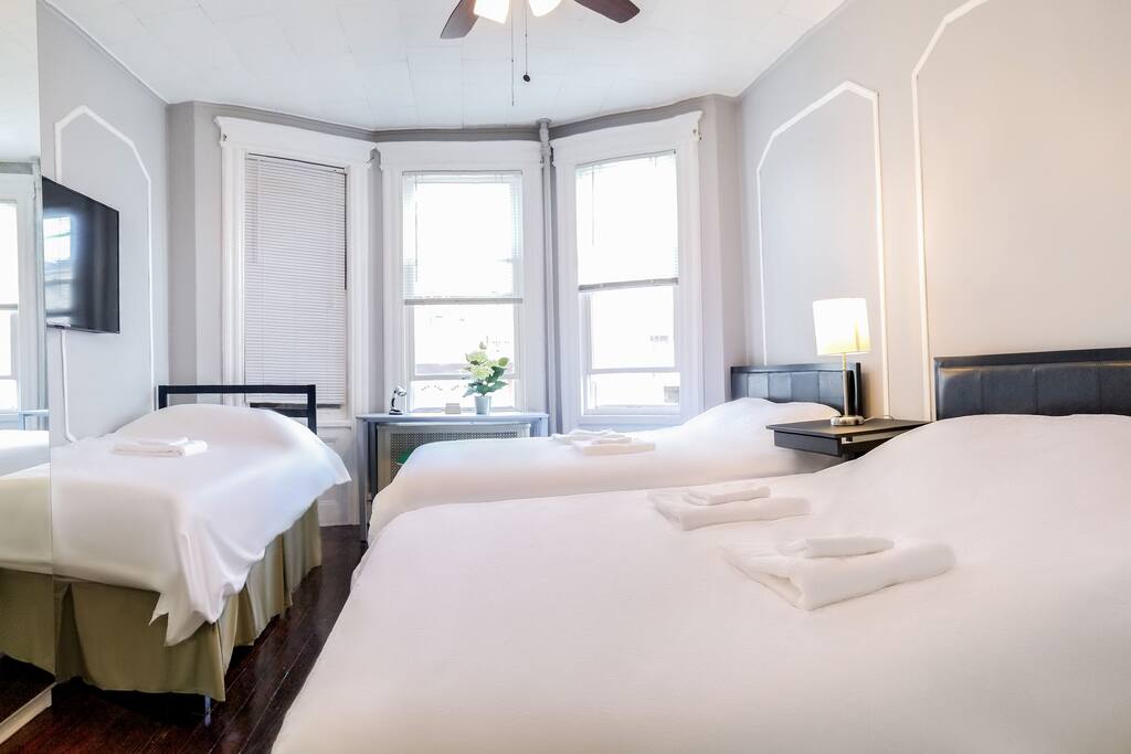Master bedroom accommodates up to 5 guests with 2 double beds and 1 single bed furnished with luxurious gel memory foam mattresses
