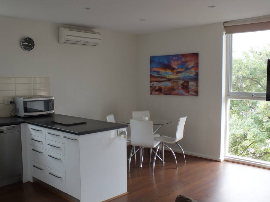 Dining table to accommodate four people