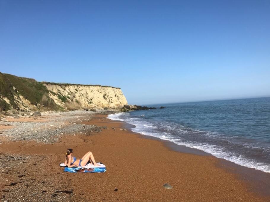 This wild and quiet beach is just a ten minute walk along the coast from the garden (local's secret!)