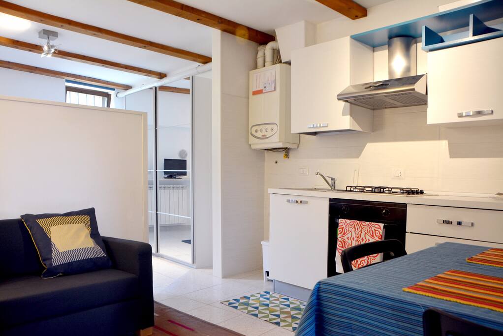 kitchen and livingroom area angolo cucina soggiorno