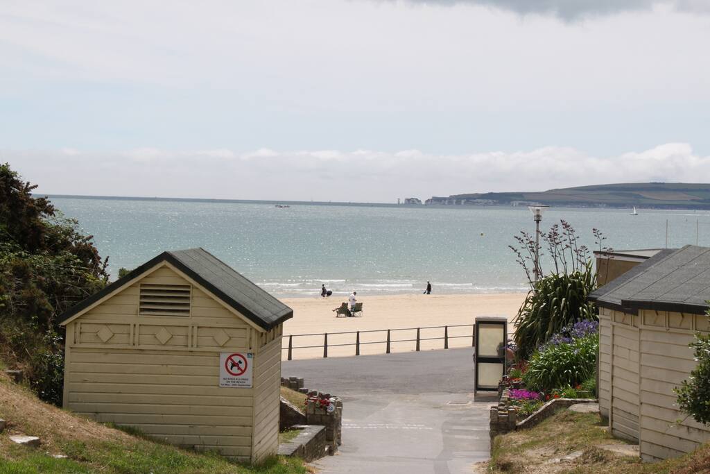10 min walk to beach, served by delightful woodland walk with above to look forward to at the end!
