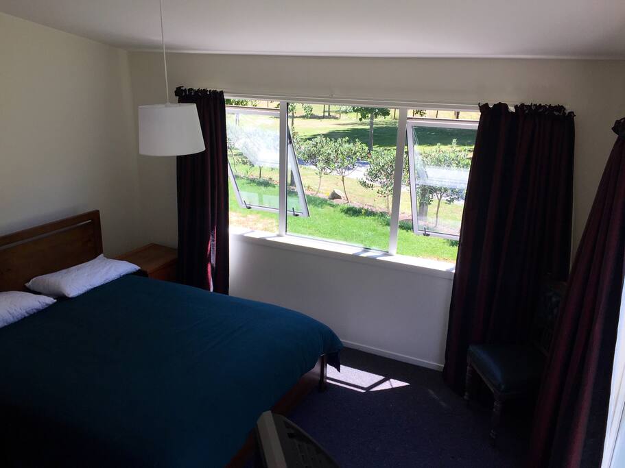 Queen bed off lounge area