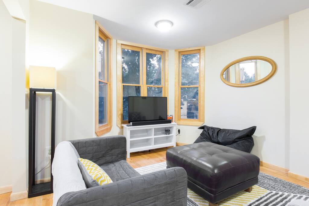 Living room: w/ 42 inch HDTV and Amazon Fire TV (HBO GO, Netflix, Amazon Prime videos, etc) ***Flooring has been changed to brand-new carpeting***
