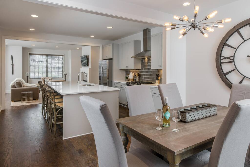 There is a coffee and cocktail bar, granite countertops, and stainless steel appliances