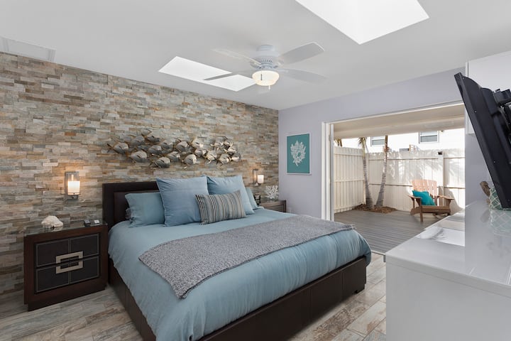 Bedroom with French Doors Open o Deck