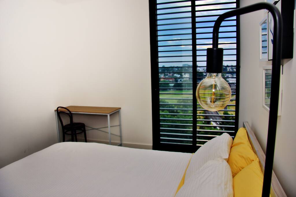 Floor to ceiling double-door window with Wentworth Park, Anzac Bridge and Harbour views!