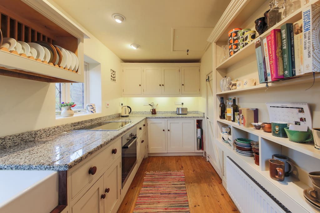 Hand built wooden kitchen with granite worktops