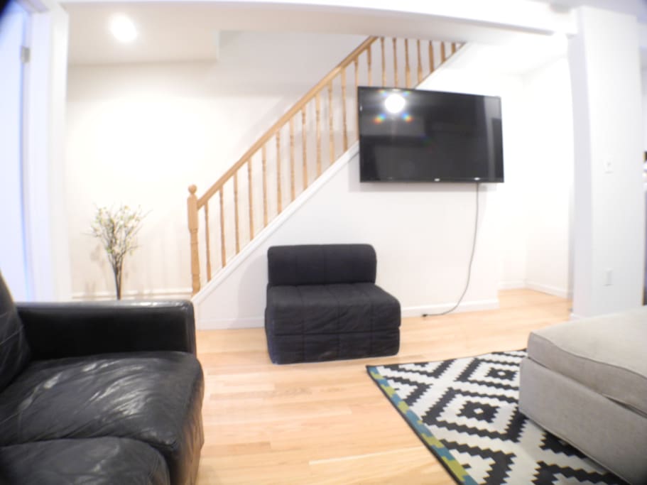 Living Room 1 has extra Large Screen TV