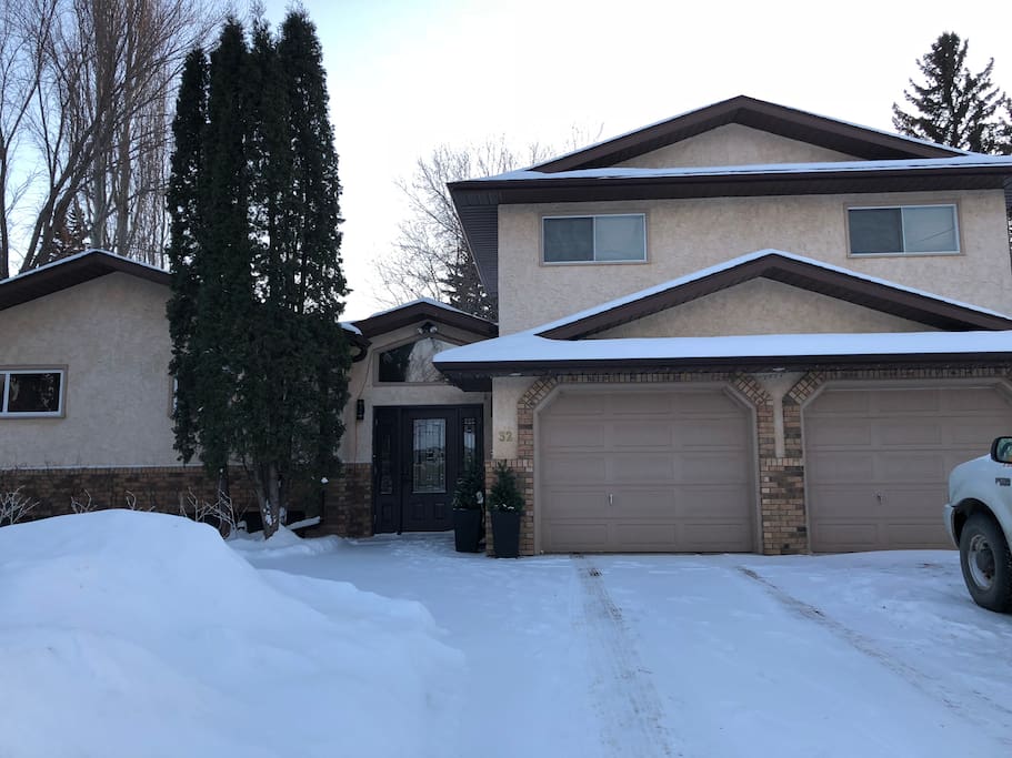 Front of the house, the suite is above the garage with entrance from inside the house and a separate entrance from the back yard.