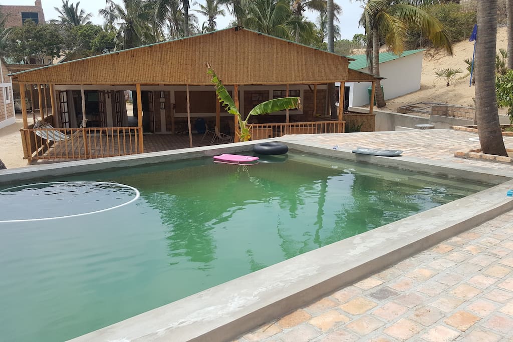 Swimming pool and play area for kids.