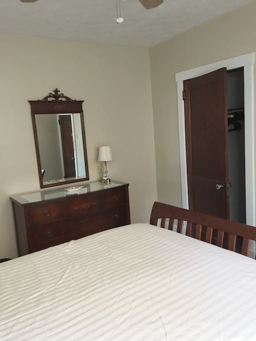 Beautiful, mahogany three-drawer dresser & mirror.