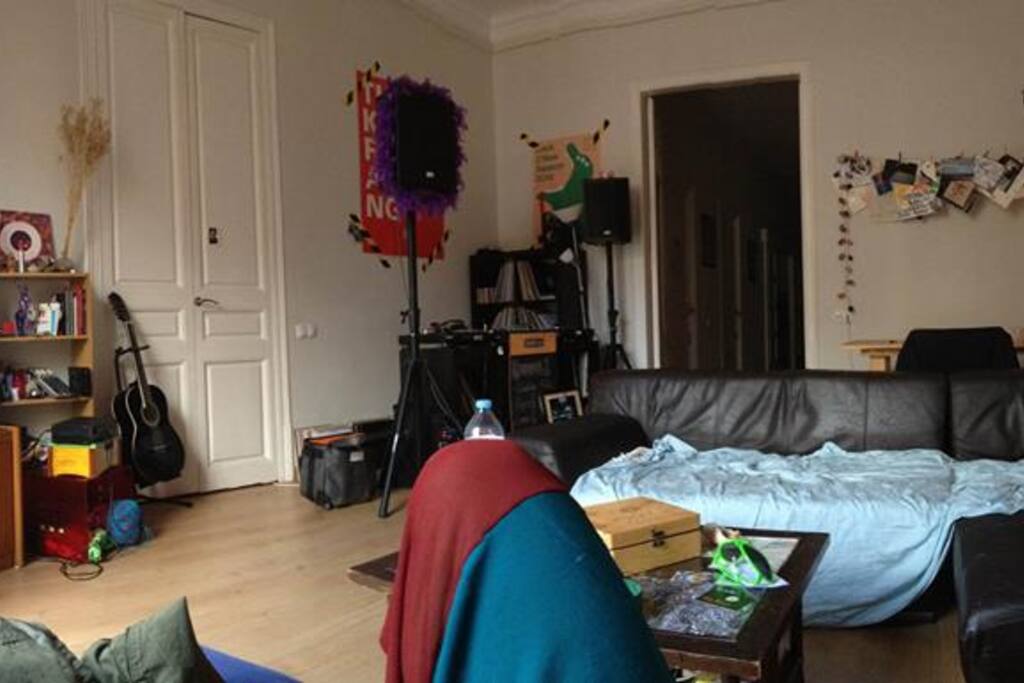 LIVING ROOM. With DJ console and projector for big screen and HD movies! :)