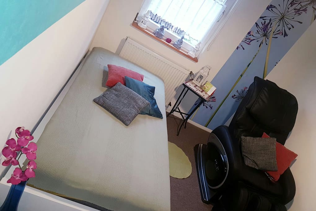 Zimmer mit Massagesessel