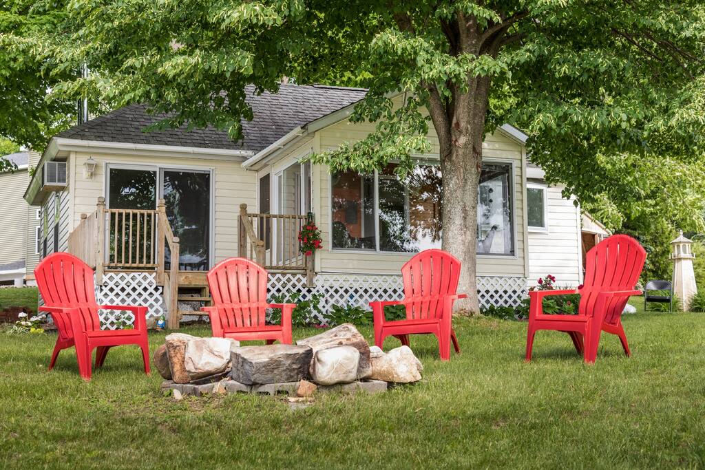Adirondack chairs around the fire pit