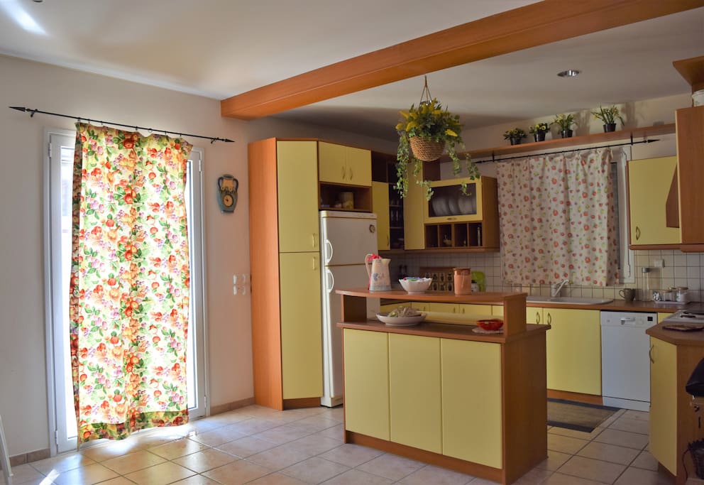 Fully equipped kitchen with fridge, freezer and dishwasher