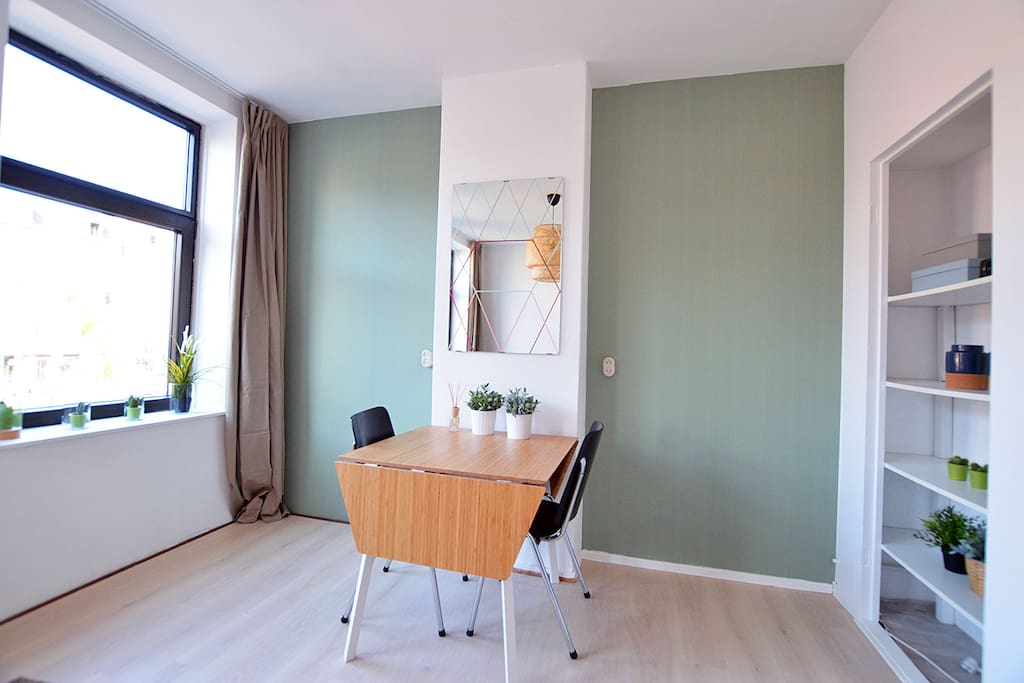The dining table can be used as a workspace as well