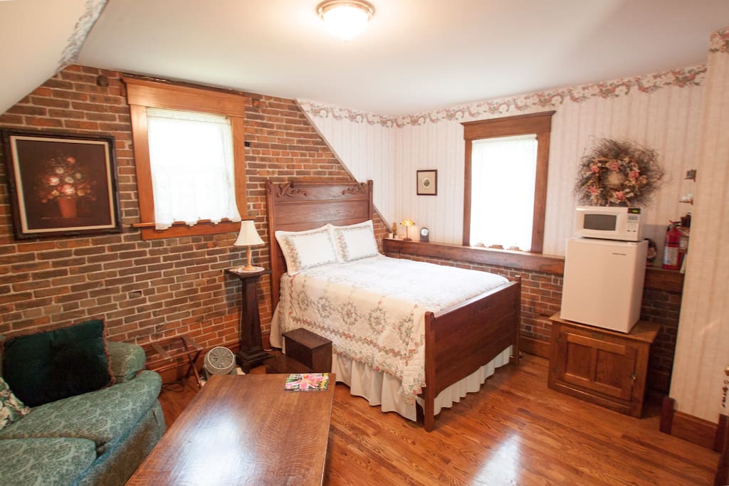 Spare full bed and sitting area, mini fridge in unit