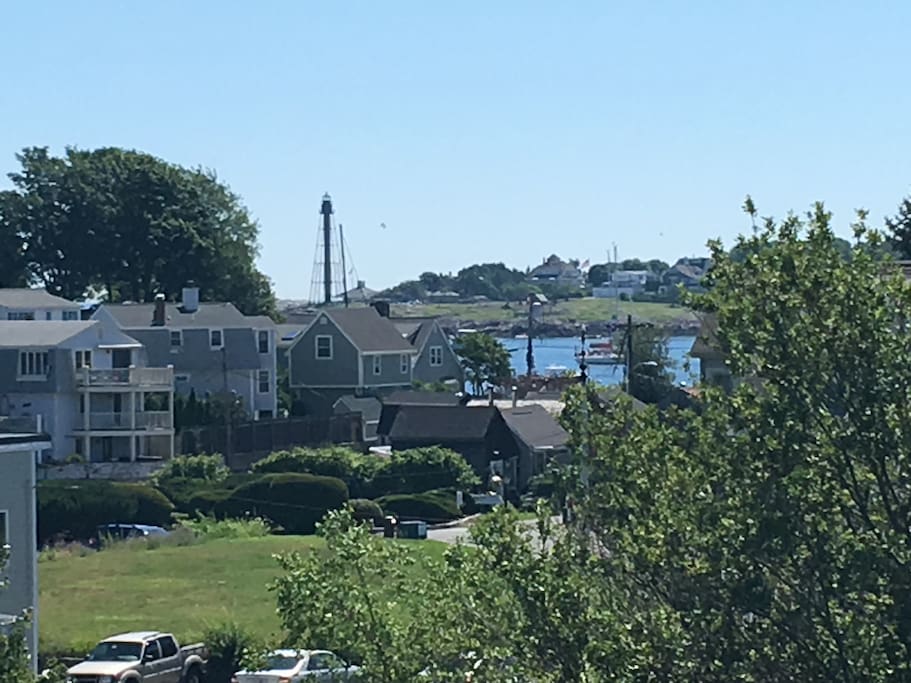 Lovely view of the harbor and lighthouse from our deck.