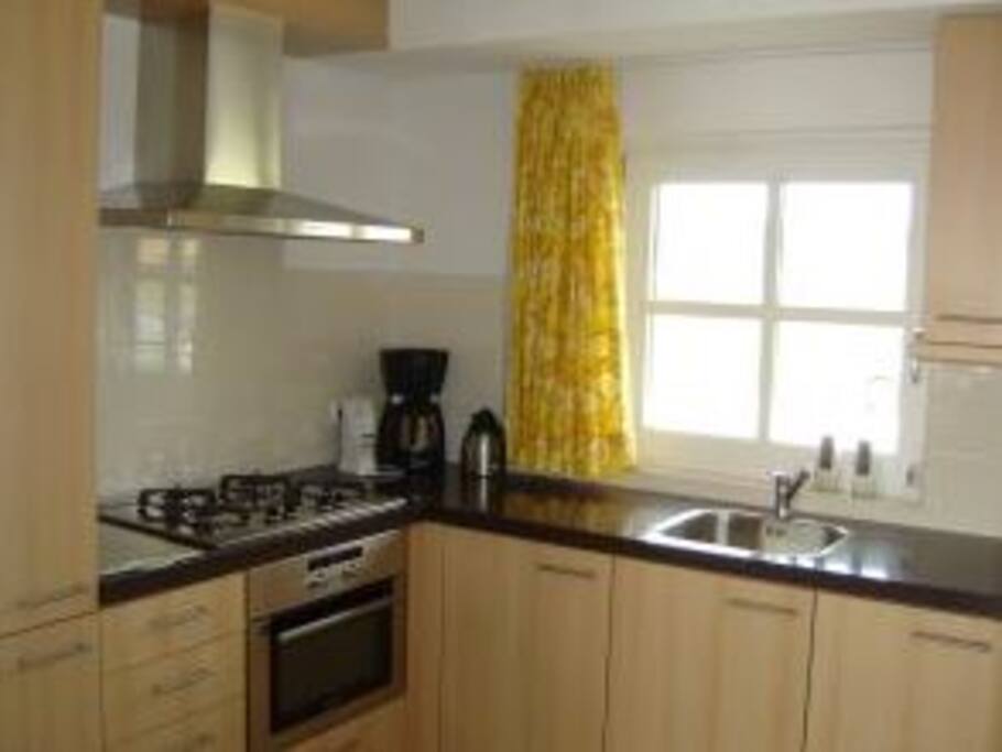 kitchen: complete with fridge, freezer, microwave/oven/etc.