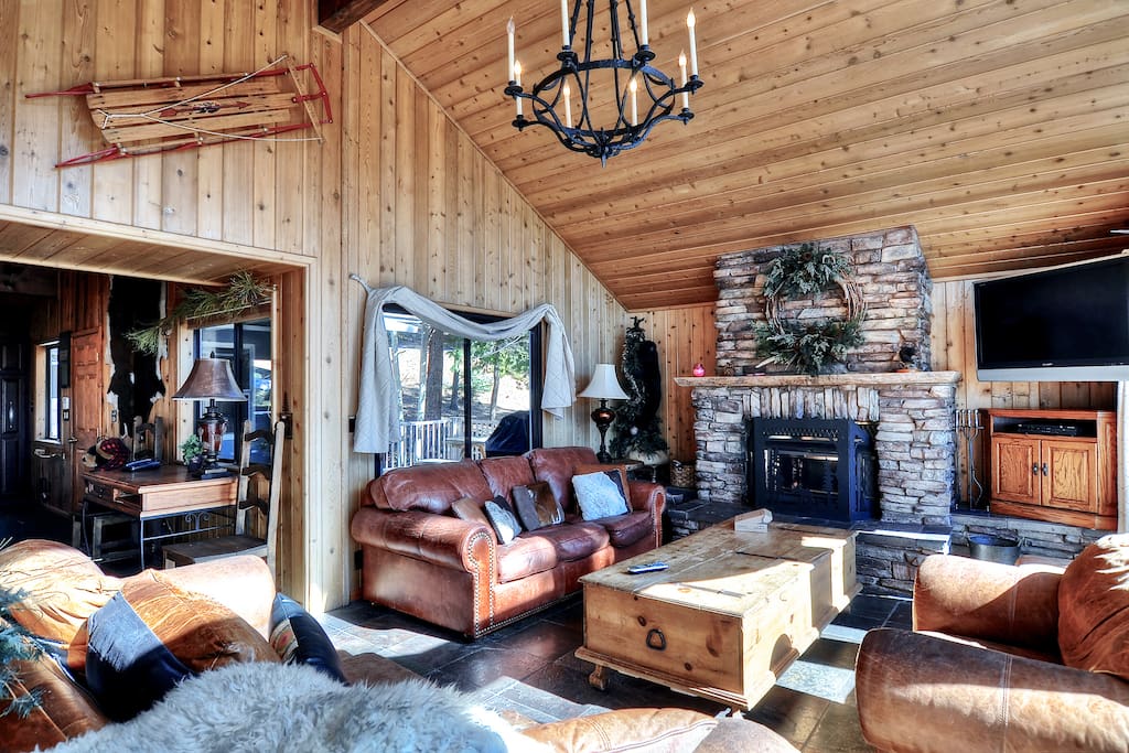 Comfortable living room seating area with home theater.
