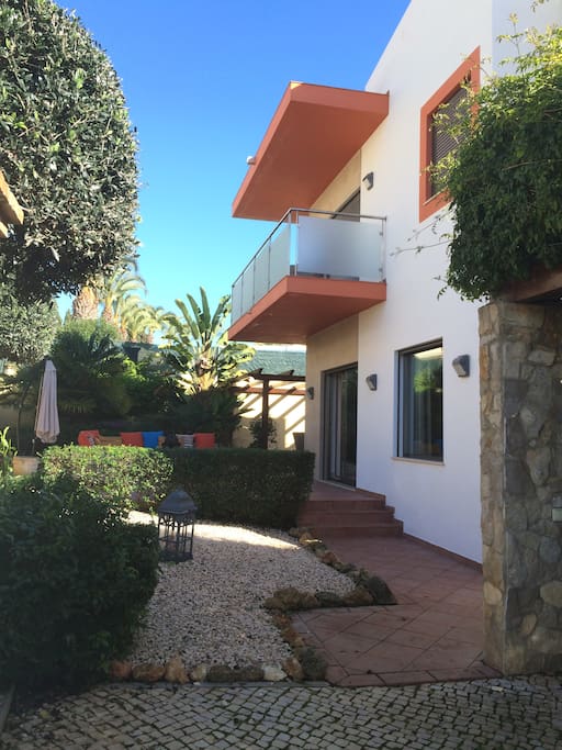A view of the front of the contemporary built in a very modern style with spacious and light rooms.