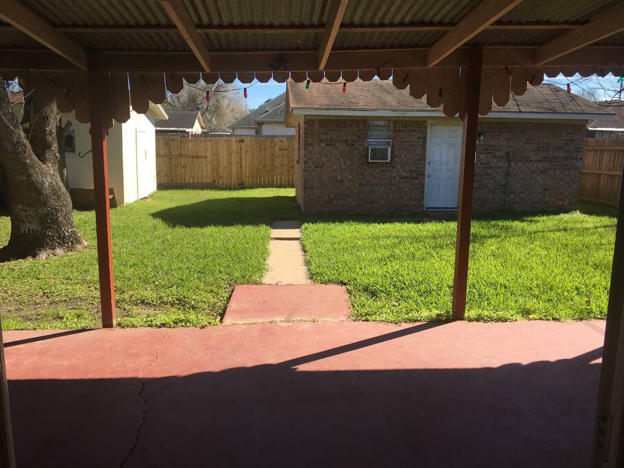 Patio, backyard, and efficiency. The efficiency has a shower, sink, stove, AC unit, ceiling fan, but no furnishings. You're welcome to use this room with a blow up mattress. I have a poker table and 2 beer pong tables for at home celebrations on the patio.