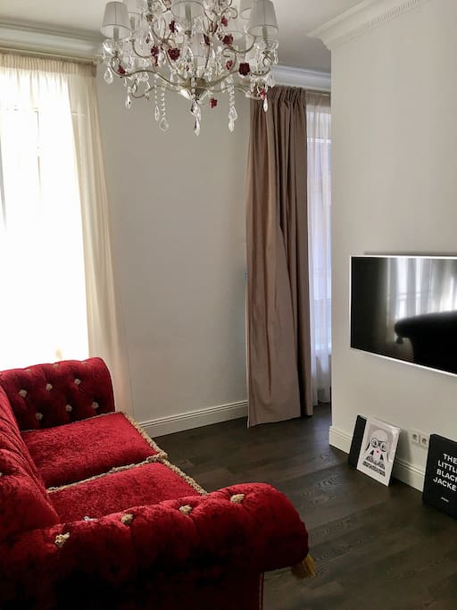 Living room with Bluetooth sound system and TV