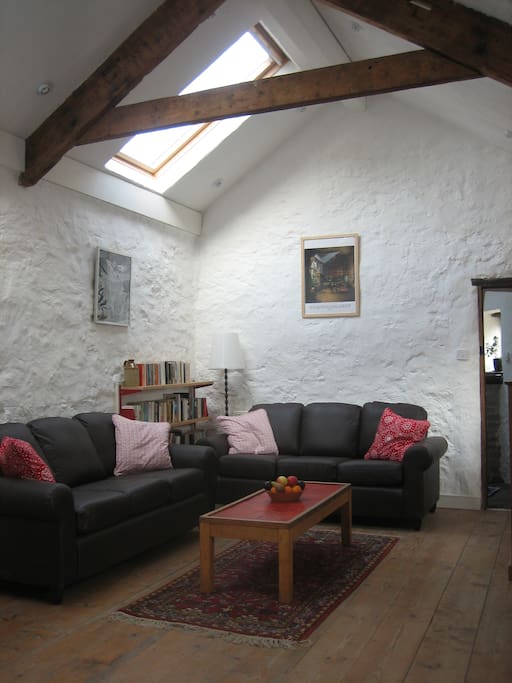 The sitting room has two large west facing skylights which flood the room with natural light.