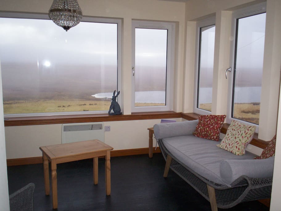 Stunning views over the loch from the sunroom