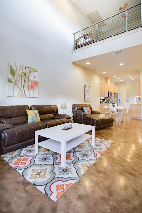 The living space is warm, open and inviting. It's a great space for relaxing and hanging out during your time in Austin.