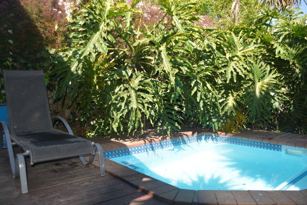 Sliding doors open on to splash pool