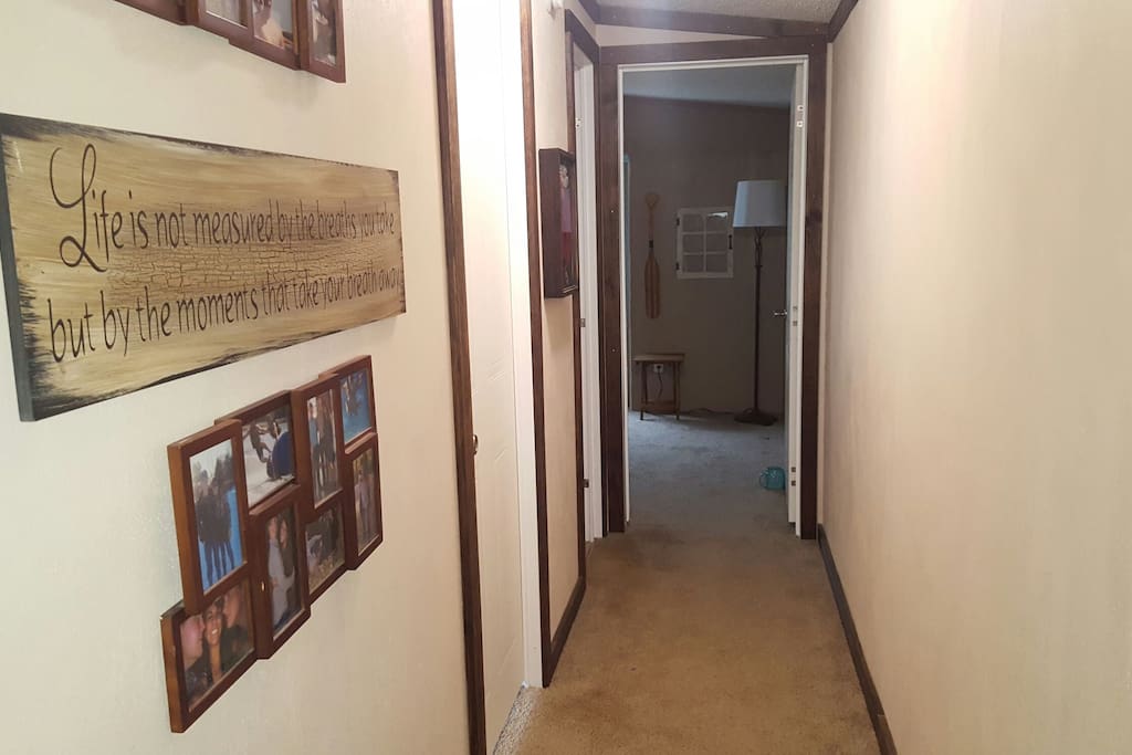 The hallway between the living room and guest bedroom