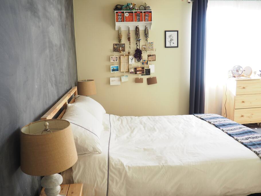 Spacious bedroom gets great afternoon sun, but the blackout curtains will ensure you stay fast asleep at any hour