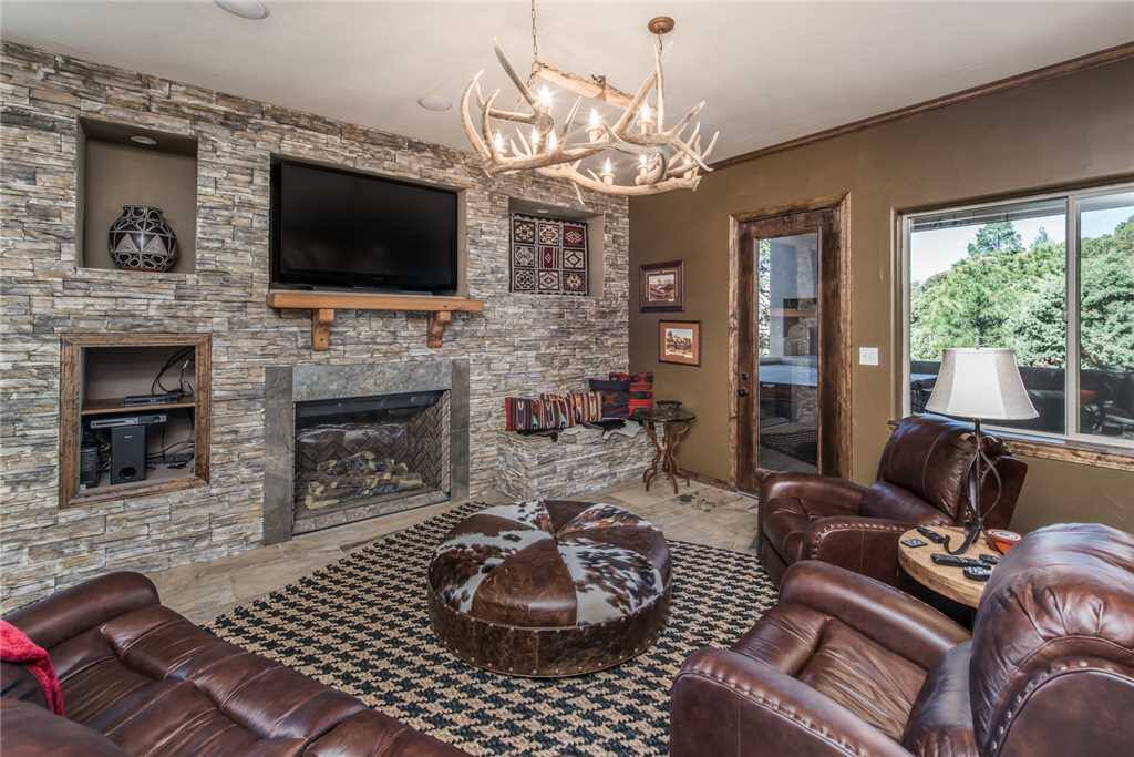 Gather in the lovely living room for movie night! - Pop a few bowls of popcorn, put a movie in, and settle in for a fun family night. The flat-screen TV keeps the group entertained any time of year!