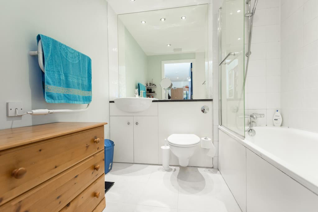 bathroom has bath and shower